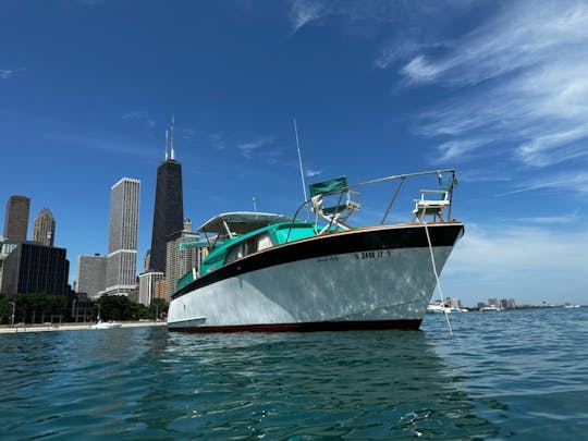 ¡Alquiler de yates Chris Craft en 1962 en el río Chicago!