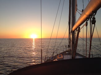 Exclusive sunset on a sailing boat 