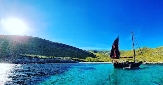 Old pirate sailboat on the coast of Pollença, Mallorca.