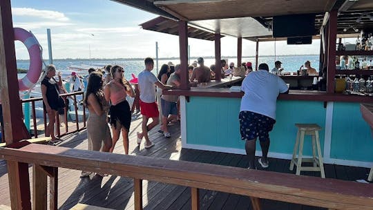 Snorkel at a tropical reef feed the swimming pigs have lunch at a floating bar 