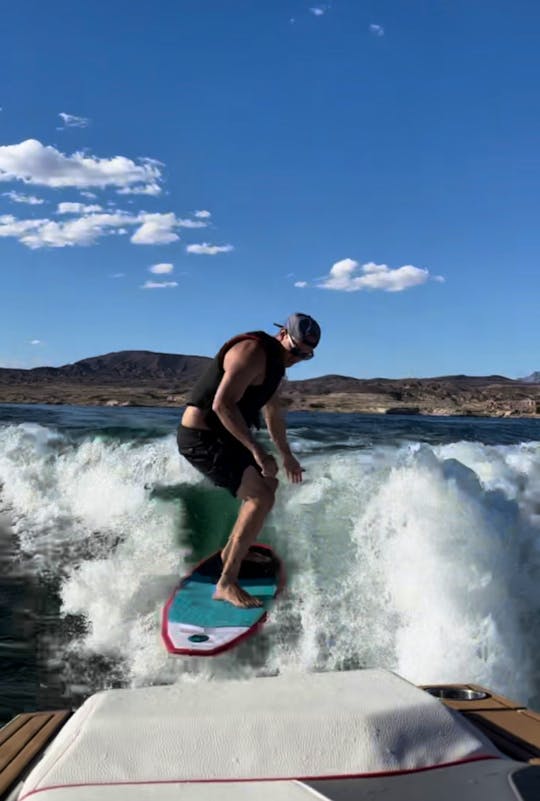 Surf, Wakeboard, Ski, Tube on this sexy Air Nautique 24ft