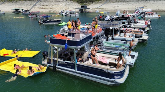 Double Decker Party Boat with a Waterslide and Lily Pad on Lake Travis