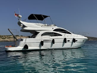 Astondoa 43 FlyBridge Yacht in St. Julian's fit up to 9 people