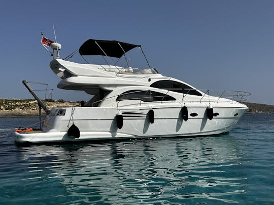 Astondoa 43 FlyBridge Yacht in St. Julian's fit up to 9 people