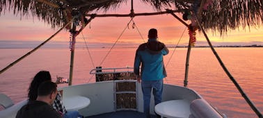 Excursão turística com golfinhos ao pôr do sol em Cocoa Beach, Flórida