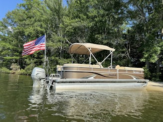 Pontón Godfrey Sweetwater de 24' en el lago Anna