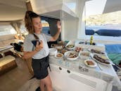 Private Cruise for up to 12 people aboard Lagoon 500 Catamaran in Santorini, Greece