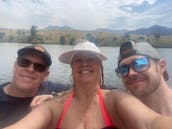 Barco Sylvan Pontoon 2022 para alugar no Lago Holter em Wolf Creek Montana!