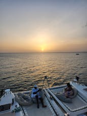 Cruzeiro ao pôr do sol em St Martin com o catamarã Lagoon 450 Cruising!