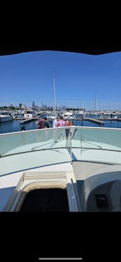 Spacious 50’ Yacht w/swim platform for rent @ 31st Harbor Charterer + 12 guests