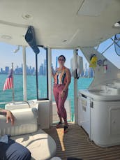 Spacious 50’ Yacht w/swim platform for rent @ 31st Harbor Charterer + 12 guests