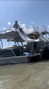 2020 Two-Story 25' Tritoon with Waterslide.  FUN captain included!