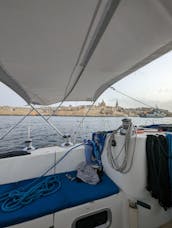 Sailing to Comino on 48ft Beneteau Sailboat