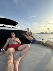 Lujoso yate italiano Azimut con moto acuática GRATUITA para viajes selectos desde Dubai Marina