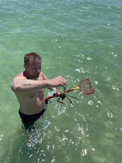 24ft Sun Tracker Fish Barge DLX Pontoon in Bradenton Beach