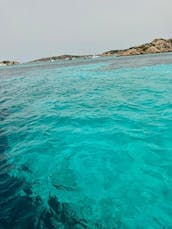 Boat tour experience with motorboat DC12- La Maddalena