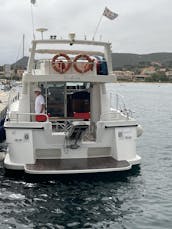 Boat tour experience with motorboat DC12- La Maddalena