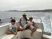 Boat tour experience with motorboat DC12- La Maddalena