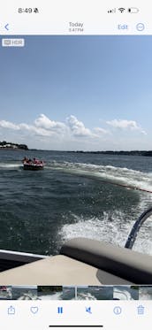 Enjoy a beautiful day on Lake Norman with a 23ft Luxury Tri-toon and free tube!