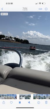 Enjoy a beautiful day on Lake Norman with a 23ft Luxury Tri-toon and free tube!