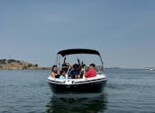 Experience Luxury & Fun on the Water with Our Big Beautiful Boat + Tube & Skis