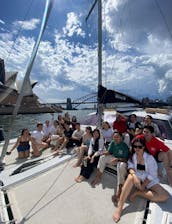 Sydney Harbour Charter on SPELLBOUND a luxury 12m Sailing Catamaran.