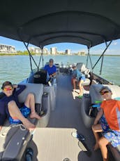Luxury 22' Veranda Tritoon with 200 Yamaha hp, seating for 10