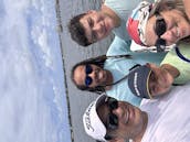 Barco de 28 pés com plataforma de natação: passeio divertido até Peanut Island e Sandbar