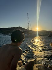 Cruzeiro privado para a costa sul de Mykonos, ilha de Rhenia ou cavernas de Tragonisi