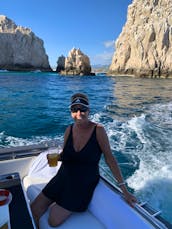 Private 46ft yacht cruise in Cabo San Lucas, including gourmet appetizers, free unlimited bar, snorkel equipment, towels and a paddleboard