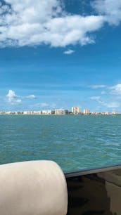 Lexington 524C 24-foot Pontoon in St Petersburg, Florida in style with Subwing and Yeti-style coolers included!!