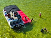 Explore the emerald waters of Destin by boat! Rent our 19' Bentley Pontoon now!
