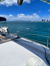 The best Sunset Cruise off Waikiki! Beneteau 43ft Hawaii sailing adventures for snorkeling and swimming! Kewalo Basin Honolulu.