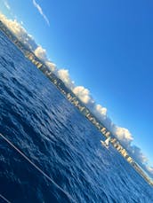 The best Sunset Cruise off Waikiki! Beneteau 43ft Hawaii sailing adventures for snorkeling and swimming! Kewalo Basin Honolulu.