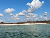 Passeios de barco fretados personalizados de Fort Myers a Nápoles. Pesca, golfinhos, descascar.