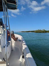 Passeios de barco fretados personalizados de Fort Myers a Nápoles. Pesca, golfinhos, descascar.