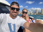 Location privée d'un catamaran à moteur personnalisé de 30 pieds à Waikiki, Hawaï