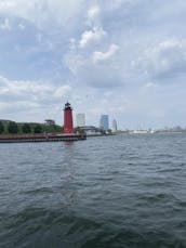 Manitou 23ft Pontoon on the Milwaukee River