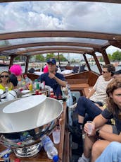 Private boat hire in Amsterdam with captain & bar!