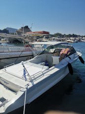 Crucero Coronet de 24 pies en barco de un día con capitán