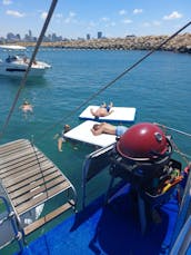 Catamarã elétrico de luxo para mais de 14 anos para churrasco e tubulação em Tel Aviv-Yafo, Israel