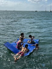 48 Ft Catamaran sailing on the Biscayne Bay . Party, Sound healing, Wingfoil