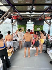 Daytime Club Experience on the Water— Party Boat with Water Toys & Pole Dancing 