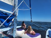 Aventure relaxante en catamaran : plongée avec tuba, voile, dauphins