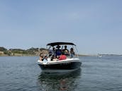 Experience Luxury & Fun on the Water with Our Big Beautiful Boat + Tube & Skis