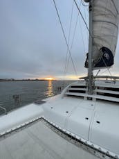 Aventures à la voile sans engelures - Catamaran avec solarium - Capitaine