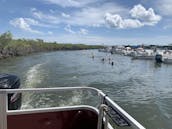 Summer Fun. 20ft Sweetwater Pontoons and sun