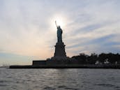 Sail New York's historic waterways aboard Water Music, a classic 40 foot yacht.