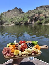 Enjoy a carefree day at Saguaro Lake with Captain Sheldon on a new 2024 wakeboat