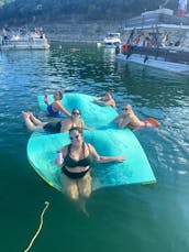 Double Decker Pontoon Boat with Slide on Lake Travis